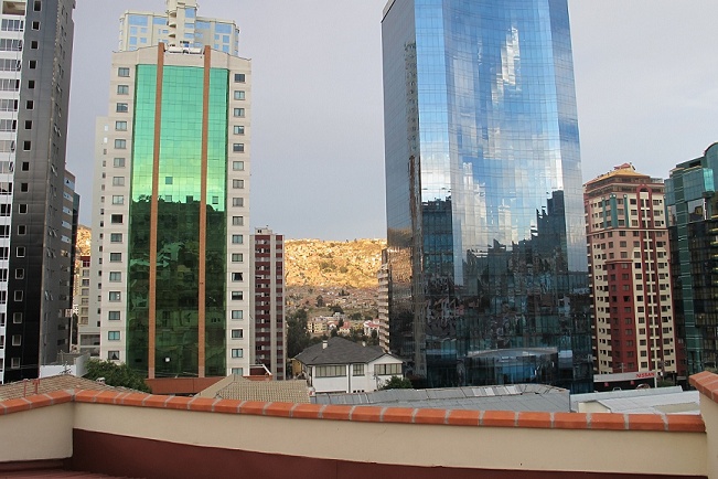 Modern sky-scrapers frame the sprawling Aymara city of El Alto.